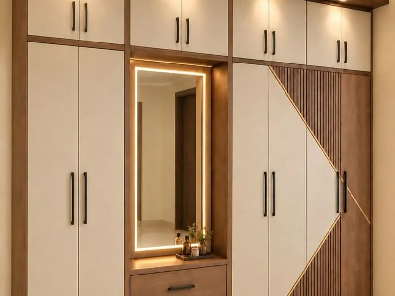 Cream and walnut wardrobe with a mirrored centre panel.